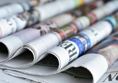 Photo of rolled newspapers