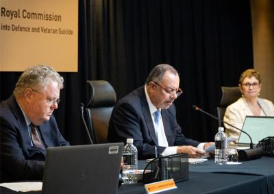 Photo of people at desk